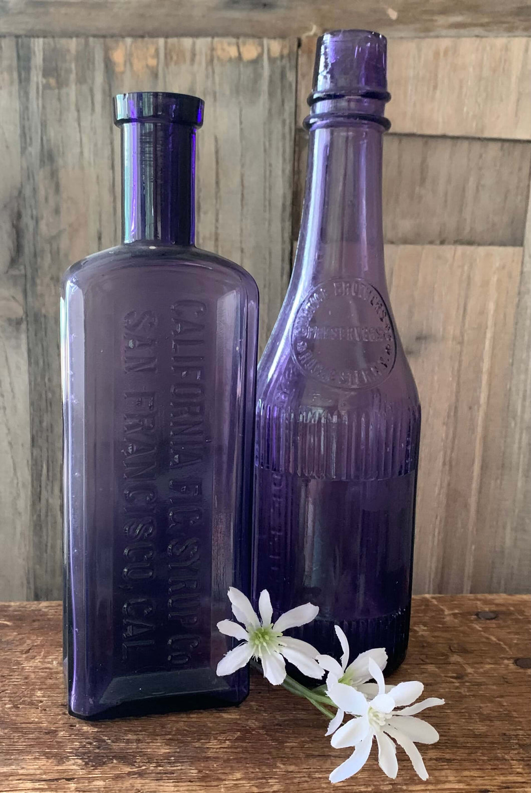 Collectable 1900's  Purple Glass Bottles